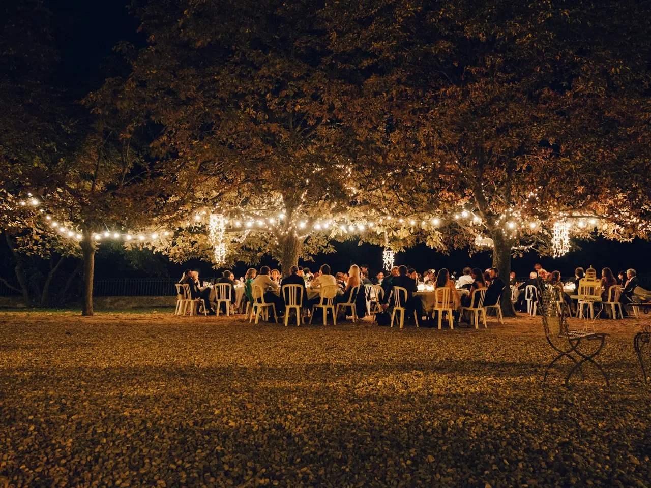 String lights over the pavilion deck after sunset